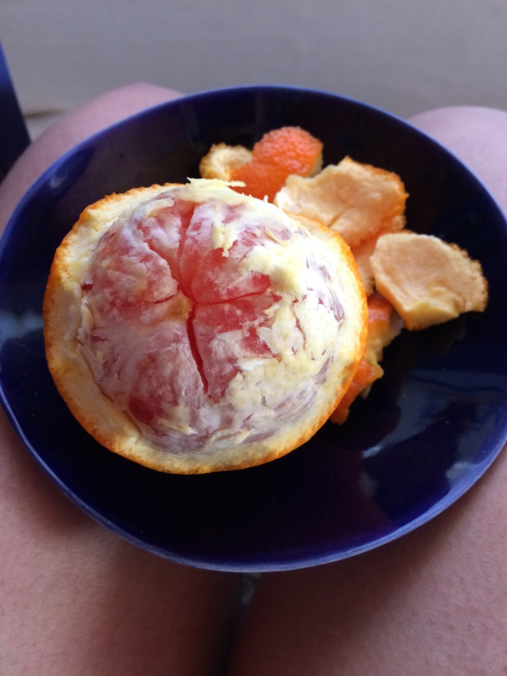 orange being peeled for me